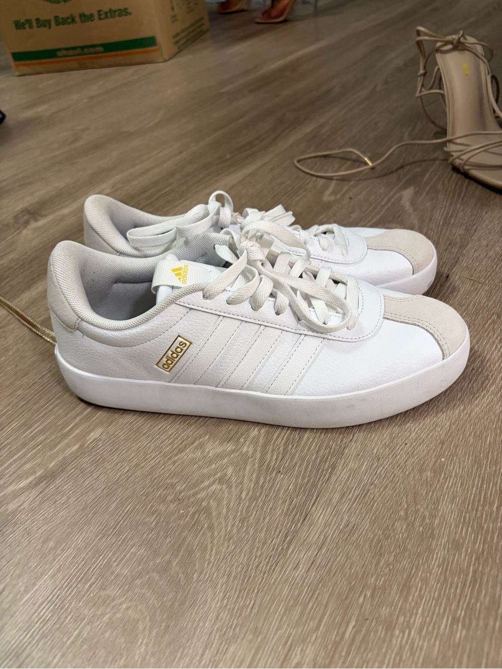 adidas Women’s White Sneakers with Gold Accents